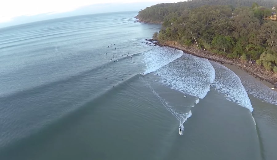 Sesión de longboard en Noosa